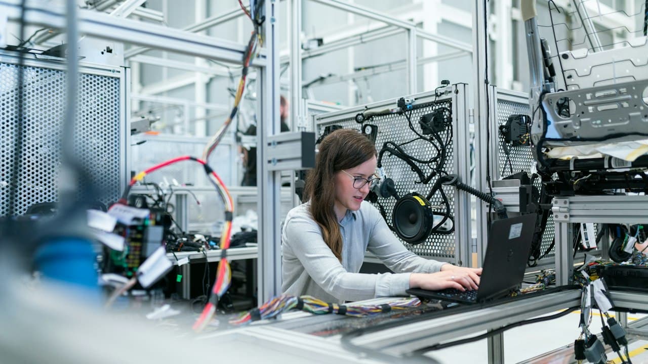 Engineer working with industrial technology and automation systems