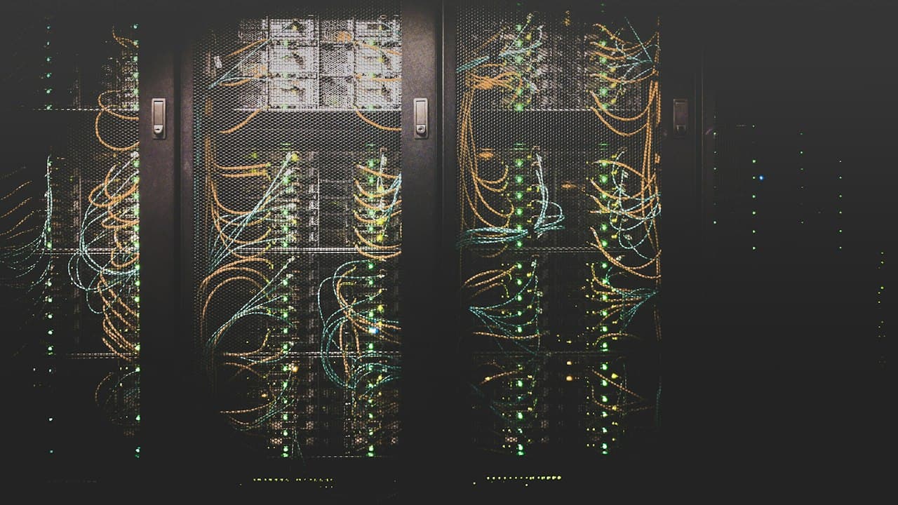 Server racks and network infrastructure representing connected knowledge systems