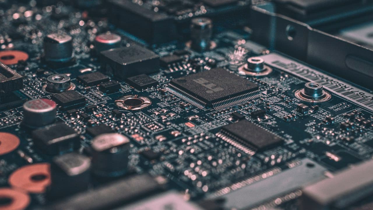 Circuit board close-up suggesting connected electronic pathways