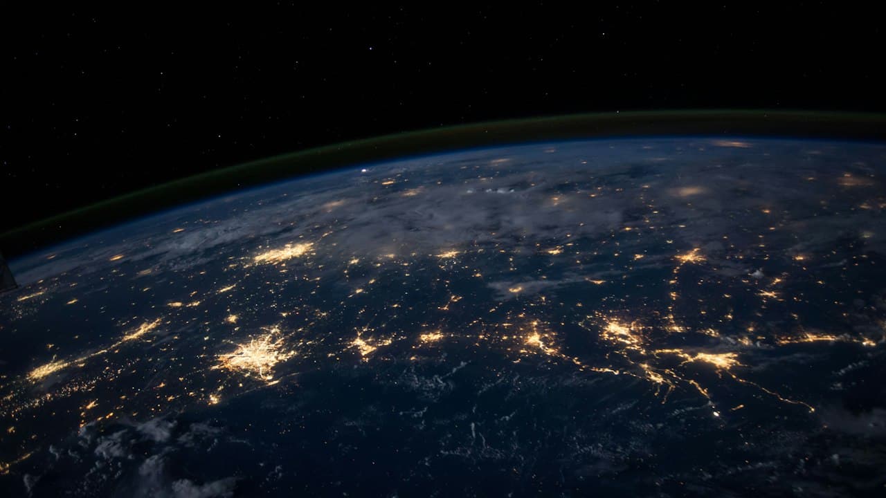 Earth from space with digital network overlay suggesting global data